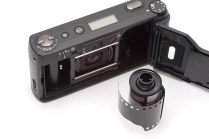 Open back on film camera over white